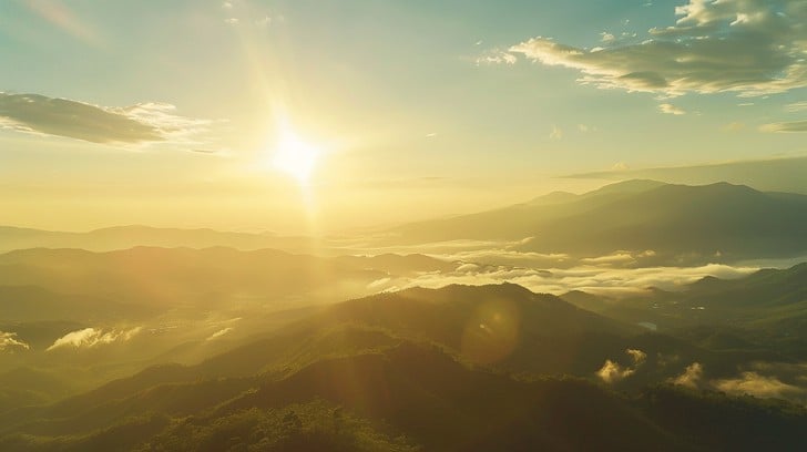 Golden light over mountain landscape